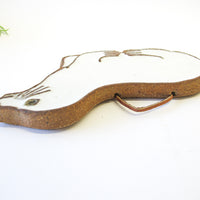 Pottery Seal Trivet in Rock Clay and White Glaze