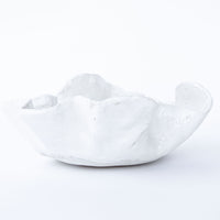 Scalloped White Ceramic Bowl with Blue Swirl Detailing