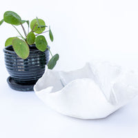 Scalloped White Ceramic Bowl with Blue Swirl Detailing
