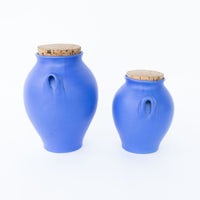 Two Bright Blue Ceramic Canisters with Handles and Cork Tops