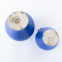 Two Bright Blue Ceramic Canisters with Handles and Cork Tops