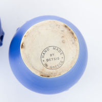 Two Bright Blue Ceramic Canisters with Handles and Cork Tops