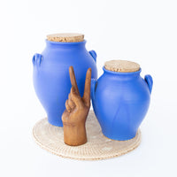 Two Bright Blue Ceramic Canisters with Handles and Cork Tops