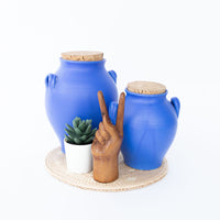 Two Bright Blue Ceramic Canisters with Handles and Cork Tops