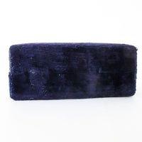 Two matching brass champagne flutes in a blue velvet box