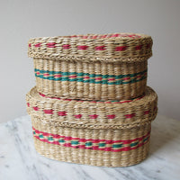 Vintage set of Two Small Intricately Woven Stacking Oval Baskets with Original Lids