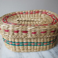 Vintage set of Two Small Intricately Woven Stacking Oval Baskets with Original Lids