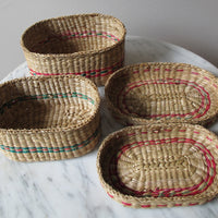 Vintage set of Two Small Intricately Woven Stacking Oval Baskets with Original Lids