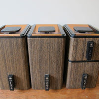 Midcentury Stackable Canister Set with Copper Flashed Lids made of Faux Wood