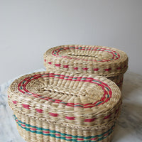 Vintage set of Two Small Intricately Woven Stacking Oval Baskets with Original Lids