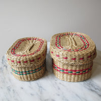 Vintage set of Two Small Intricately Woven Stacking Oval Baskets with Original Lids