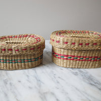 Vintage set of Two Small Intricately Woven Stacking Oval Baskets with Original Lids
