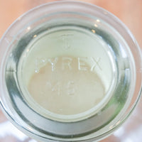 Large Vintage Clear Glass Pyrex Chemistry Bottle with Raised Lettering and Glass Penny Stopper