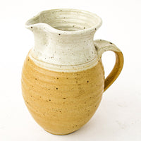Ceramic Pitcher with Golden Tone Finishes