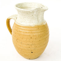 Ceramic Pitcher with Golden Tone Finishes