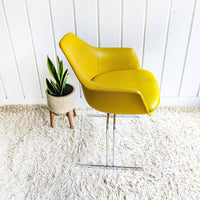 Midcentury Burke Action Chair from The Vector Group out of Texas