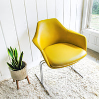 Midcentury Burke Action Chair from The Vector Group out of Texas