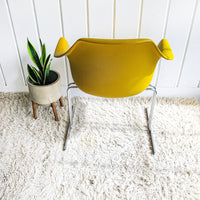 Midcentury Burke Action Chair from The Vector Group out of Texas