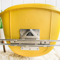 Midcentury Burke Action Chair from The Vector Group out of Texas