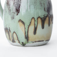 Ceramic Pitcher with Speckled Cream, Green and Blue Accenting