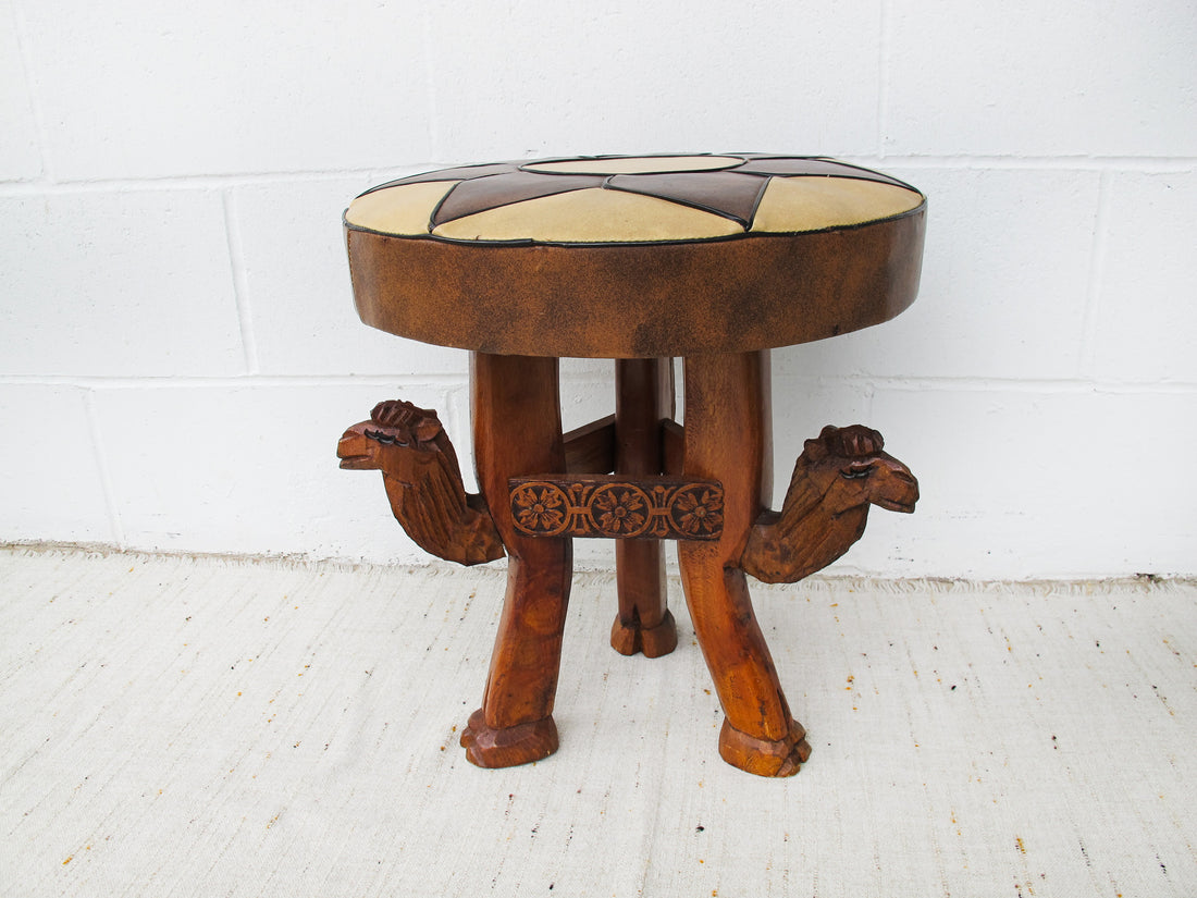 Carved Wood Camel Stool with Brown and White Star Design Naugahyde Seat