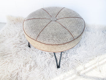 Midcentury Naugahyde circular stool with cast iron legs (original tags on bottom)