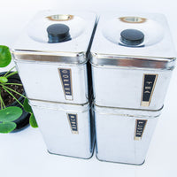 Set of 4 Chrome Canister Beautyware set