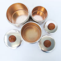 Set of 3 Rose Gold Mirro Canisters with Wood Tops and some surface wear