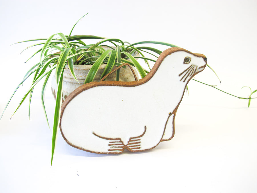 Pottery Seal Trivet in Rock Clay and White Glaze