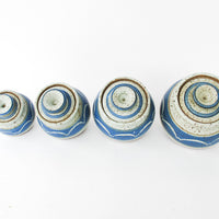 Set of 4 Hand Spun Leaning Ceramic Canisters with Button Top Lids and Blue Wave Design