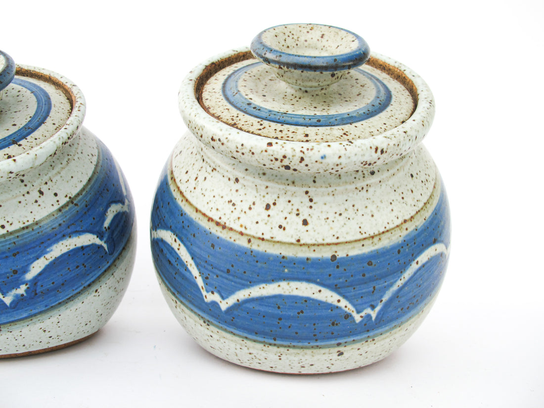 Set of 4 Hand Spun Leaning Ceramic Canisters with Button Top Lids and Blue Wave Design