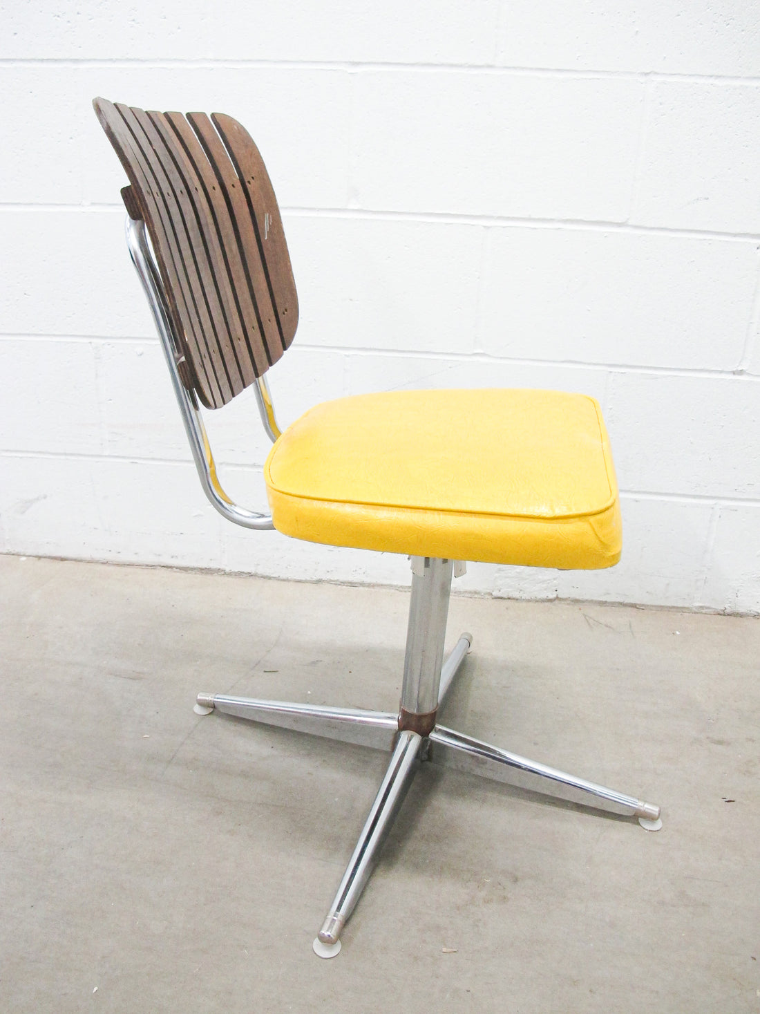 Midcentury Rotating Vinyl Chair with Slatted Wood Back and Chrome Base