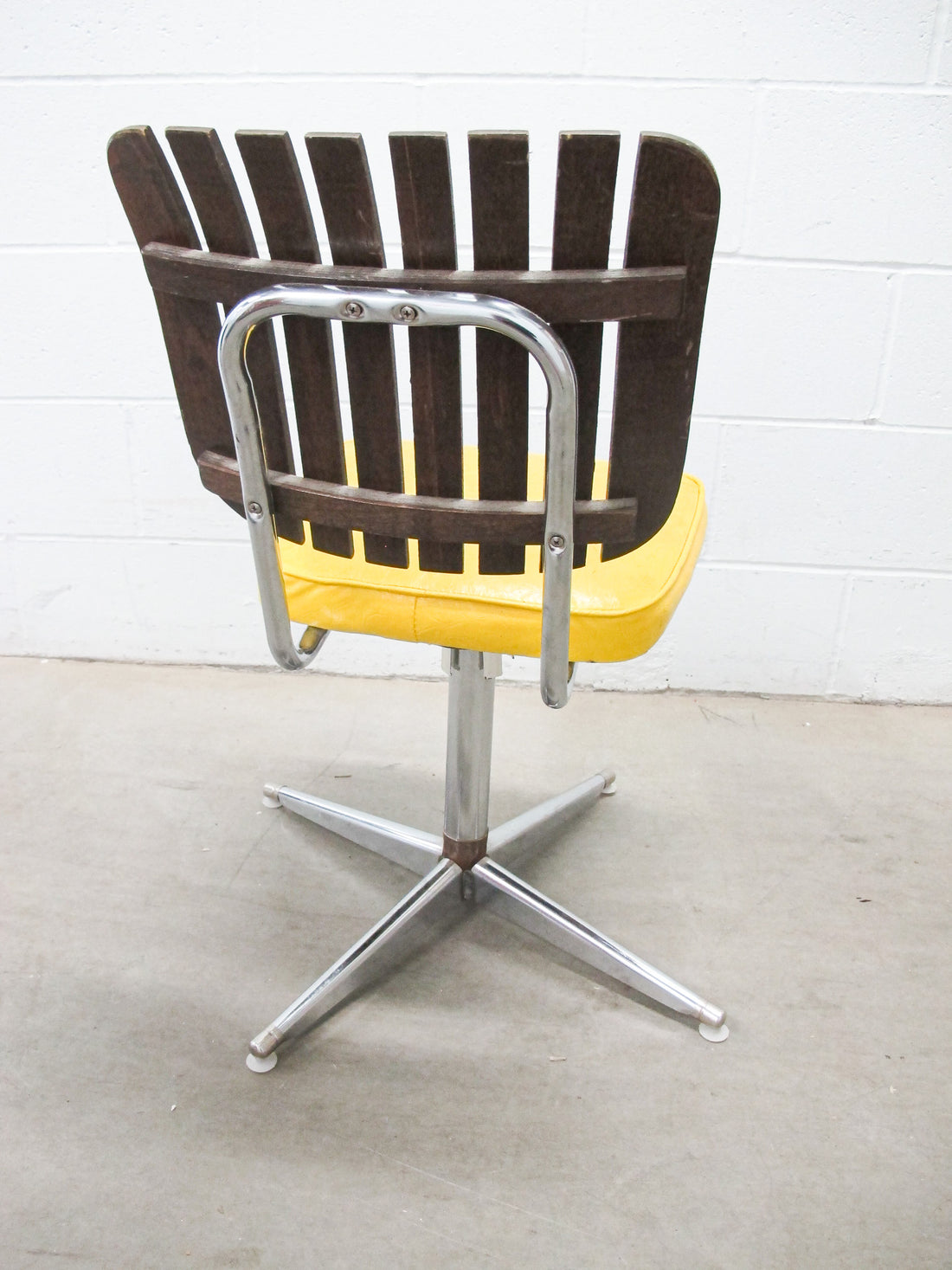 Midcentury Rotating Vinyl Chair with Slatted Wood Back and Chrome Base