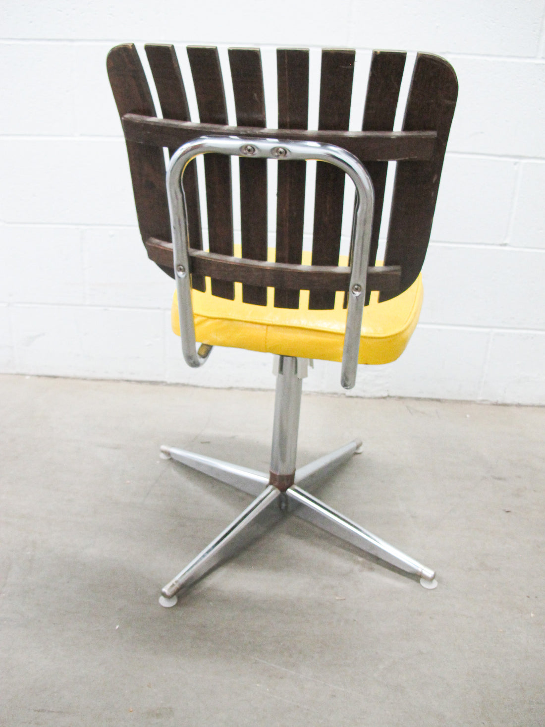 Midcentury Rotating Vinyl Chair with Slatted Wood Back and Chrome Base