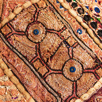 India Wall Hanging with multi-color design: brown, reds, pinks, gold