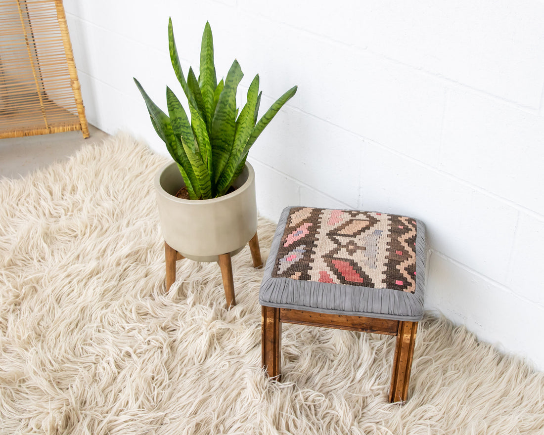 Kilim Top with Baby Blue ruffeled suede framing wood stool