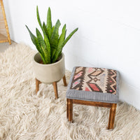 Kilim Top with Baby Blue ruffeled suede framing wood stool