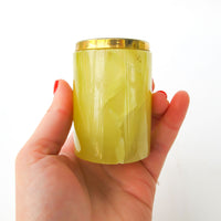 Small Yellow marble jar with brass rim