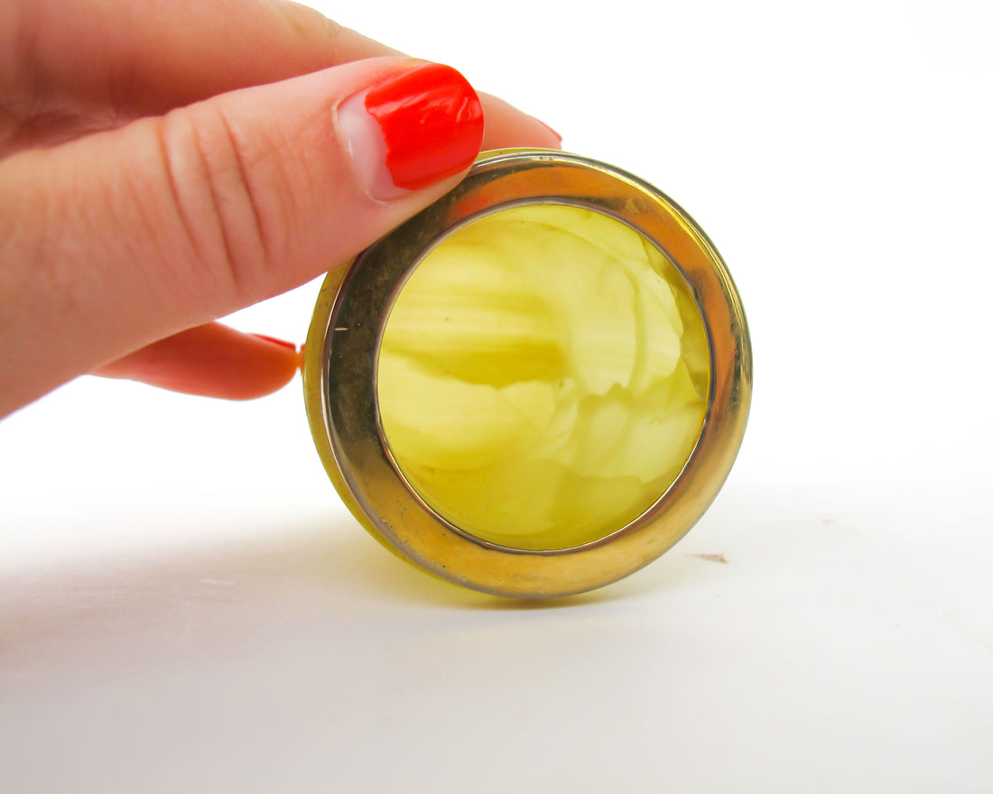 Small Yellow marble jar with brass rim