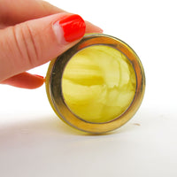 Small Yellow marble jar with brass rim