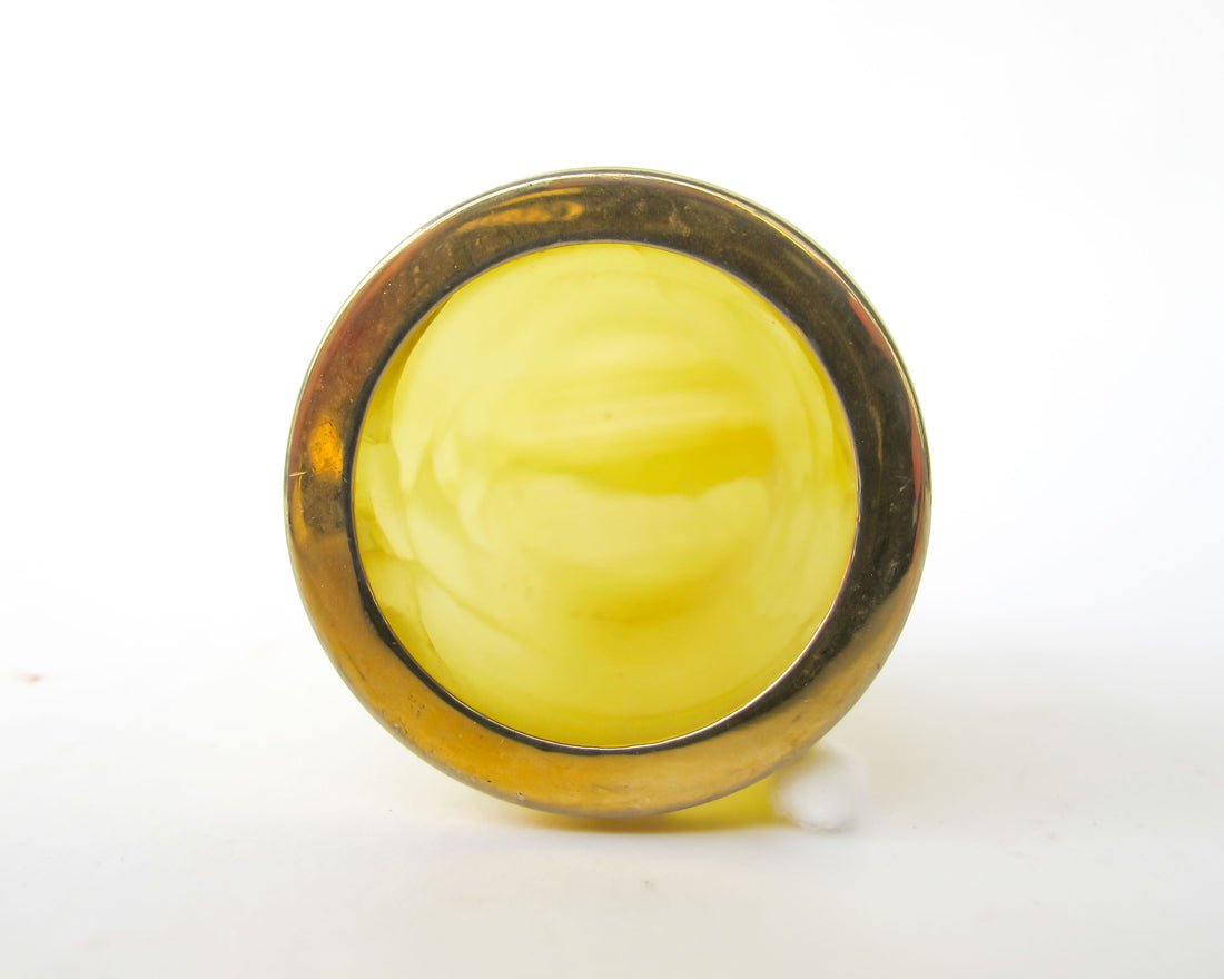 Small Yellow marble jar with brass rim