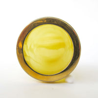 Small Yellow marble jar with brass rim