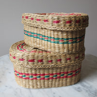 Vintage set of Two Small Intricately Woven  Stacking Oval Baskets with Original Lids