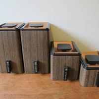 Midcentury Stackable Canister Set with Copper Flashed Lids made of Faux Wood