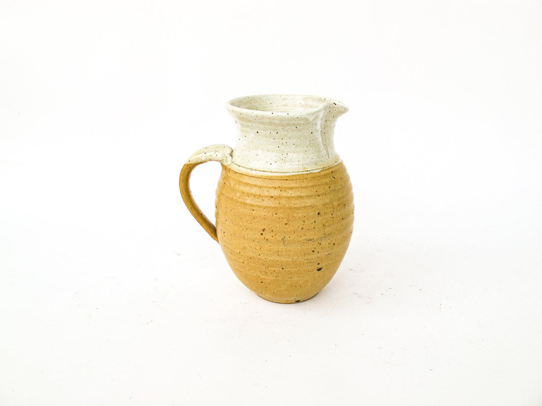Ceramic Pitcher with Golden Tone Finishes