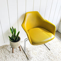 Midcentury Burke Action Chair from The Vector Group out of Texas