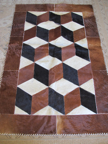 Vintage Patched Cow Hide Area Rug